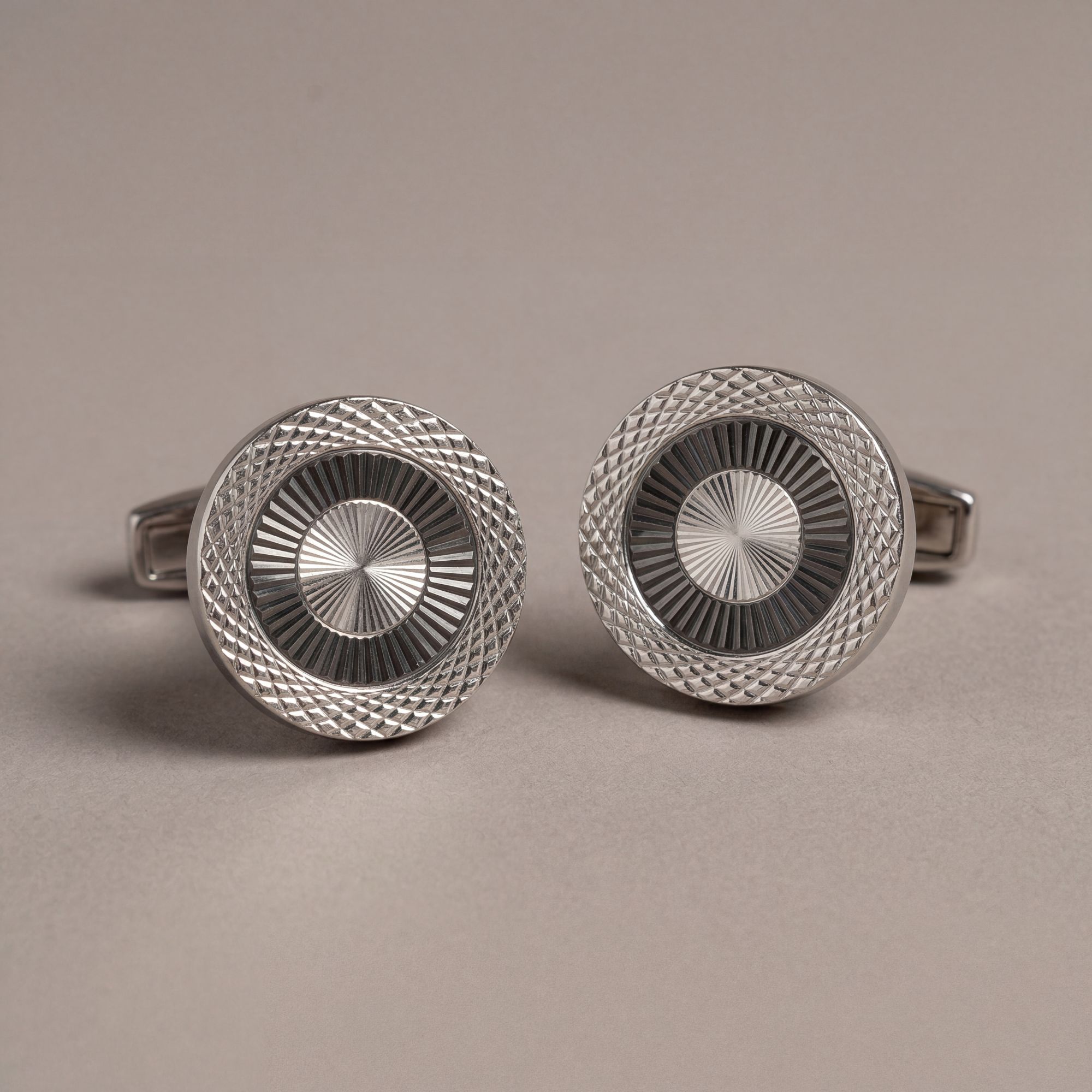 Steel cufflinks in a nickel finish with a clean formal look. Precise detailing for premium menswear by Elio Evan.
