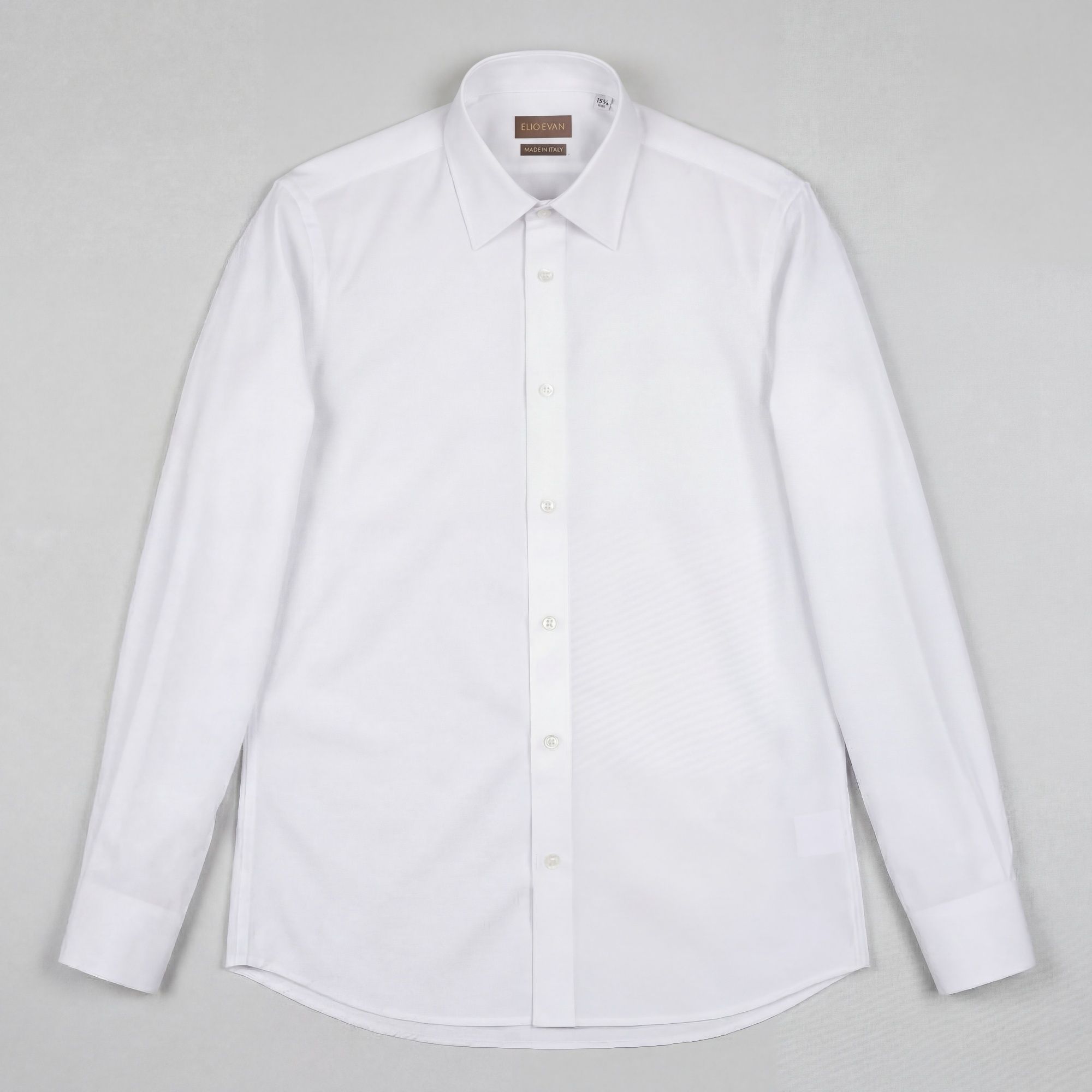 Λευκό slim πουκάμισο από 100% βαμβάκι με λεία poplin υφή, button-down γιακά και γαλλικές μανσέτες. Elio Evan.