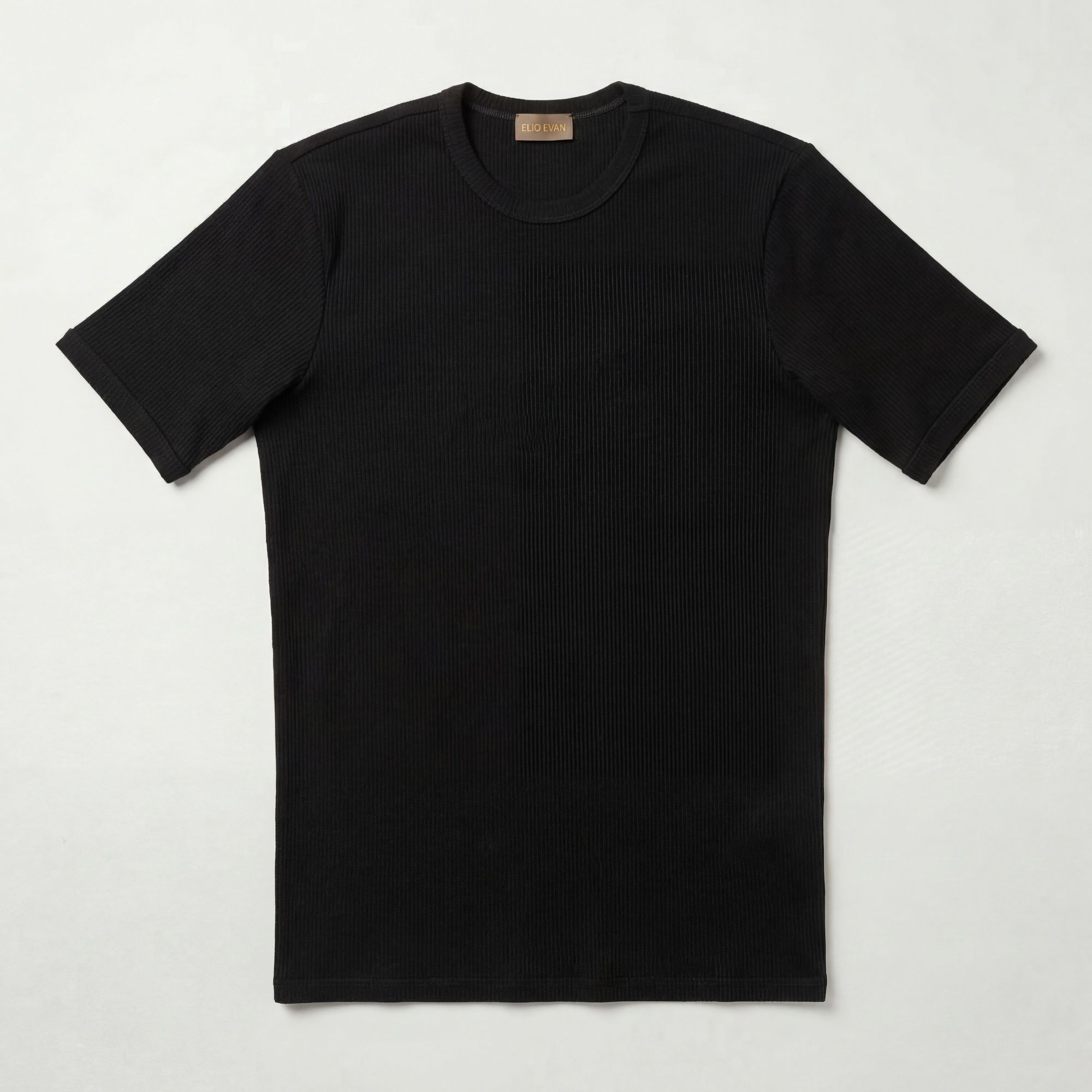 Μαύρο βαμβακερό t-shirt με ελαστική σύνθεση και σχέδιο ρίγα. Άνετη εφαρμογή και ποιοτική καθημερινή χρήση από την TAILOR