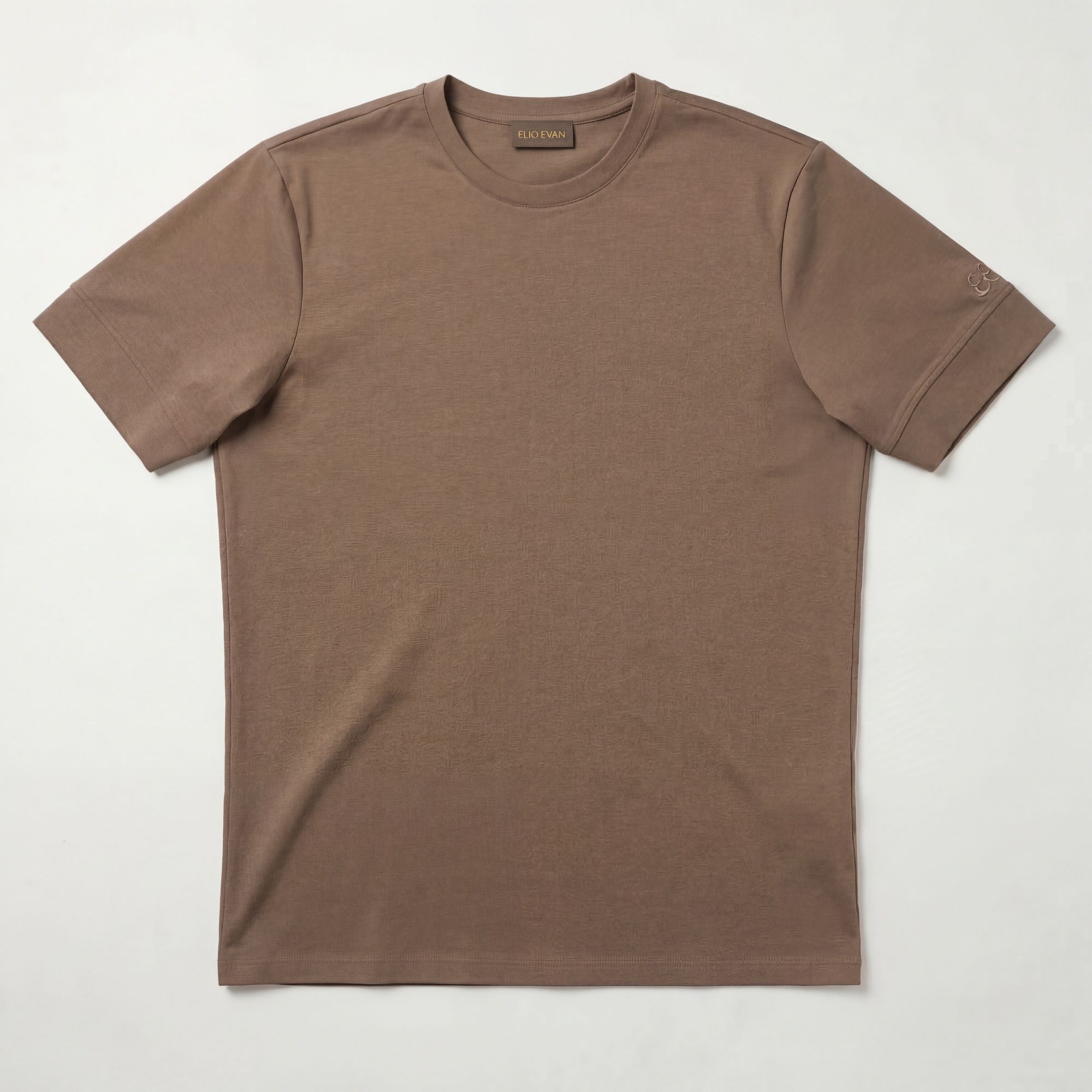 Regular-fit cotton T-shirt in beige with a smooth lightweight finish. Structured premium menswear by Elio Evan, crafted