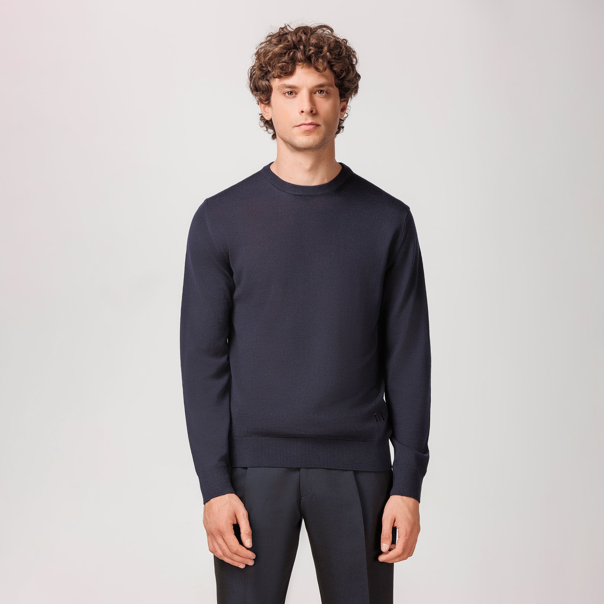 Navy Long-Sleeved Crewneck Sweater in Extrafine Merino Wool by Elio Evan, made in Italy with a flawless fit.
